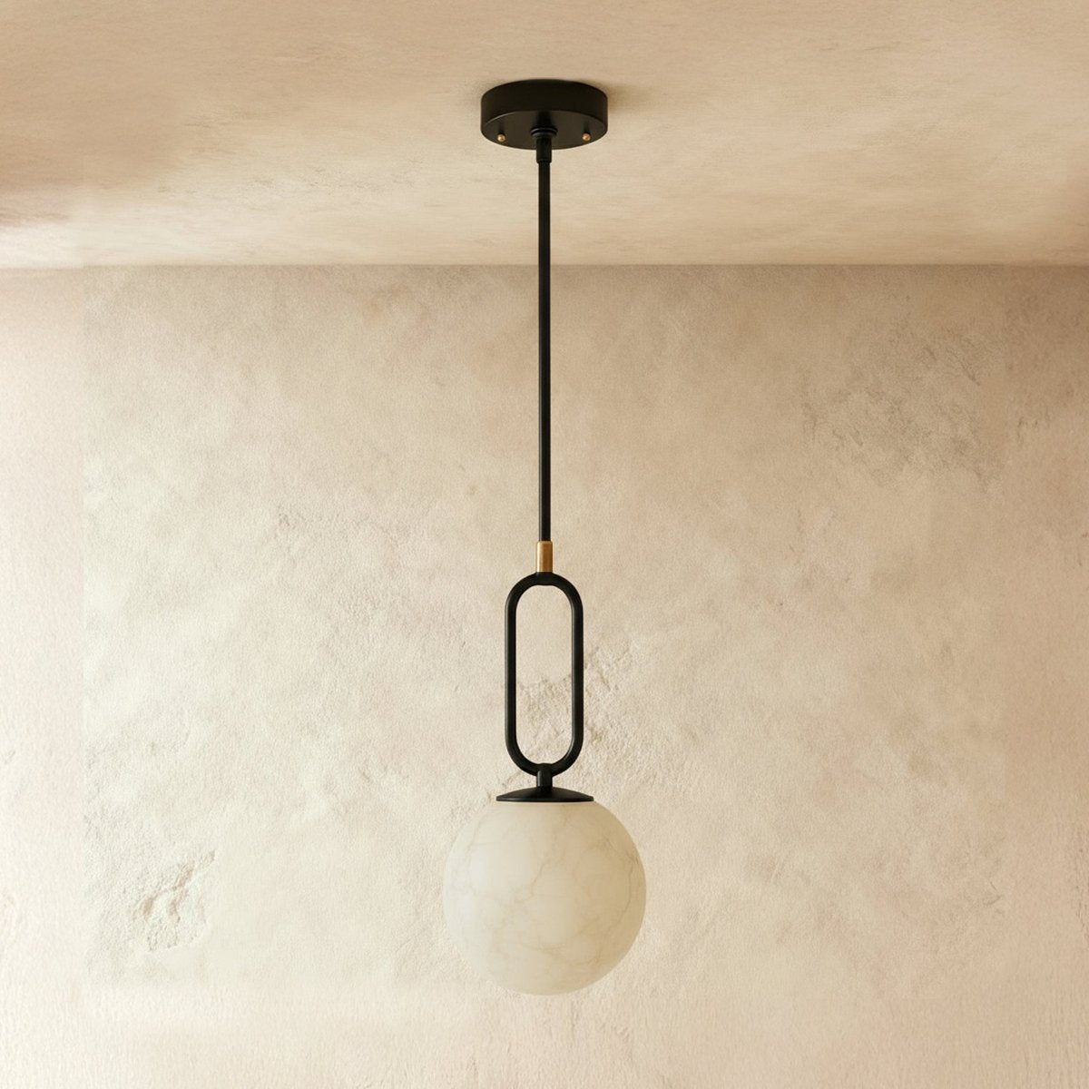 Alabaster pendant light by Residence Supply featuring a smooth, rounded gong-shaped design perfect for modern interiors.