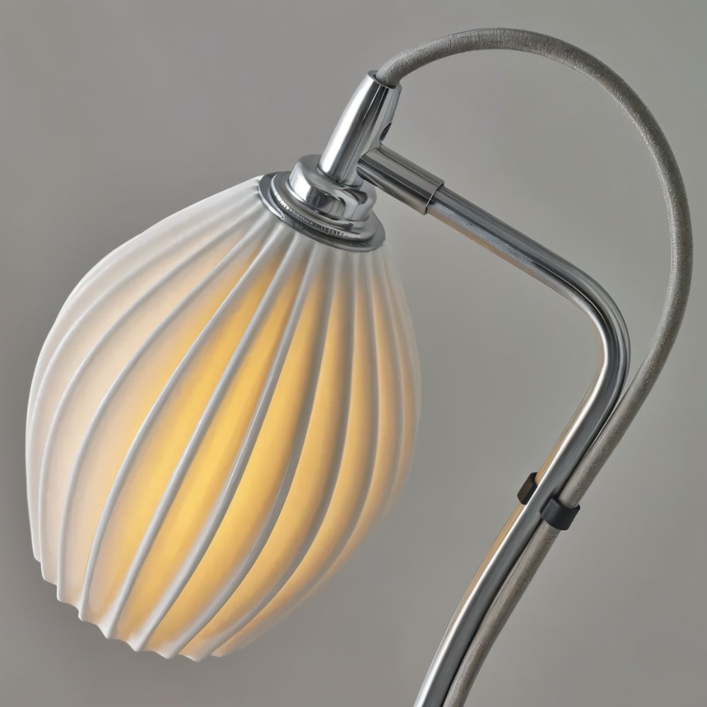 Haela Table Lamp by Residence Supply with a sleek modern design and a neutral-colored fabric shade on a wooden base.