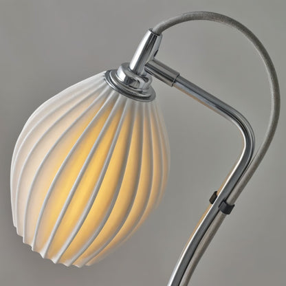 Haela Table Lamp by Residence Supply with a sleek modern design and a neutral-colored fabric shade on a wooden base.