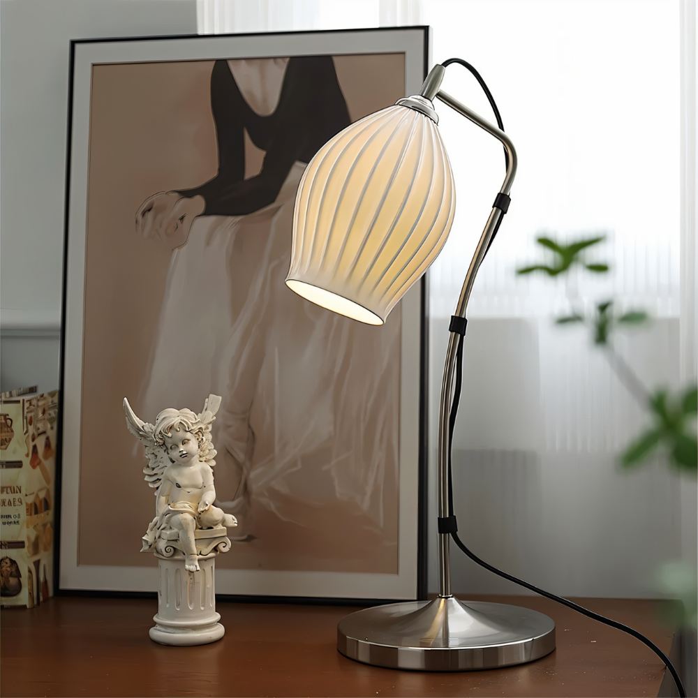 Haela Table Lamp by Residence Supply featuring a sleek ceramic base and fabric shade for modern home decor.