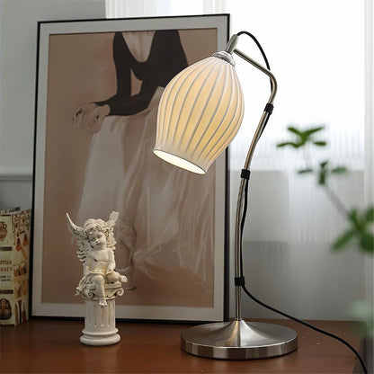 Haela Table Lamp by Residence Supply featuring a sleek ceramic base and fabric shade for modern home decor.