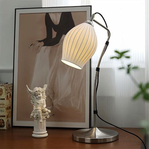 Haela Table Lamp by Residence Supply featuring a sleek ceramic base and fabric shade for modern home decor.