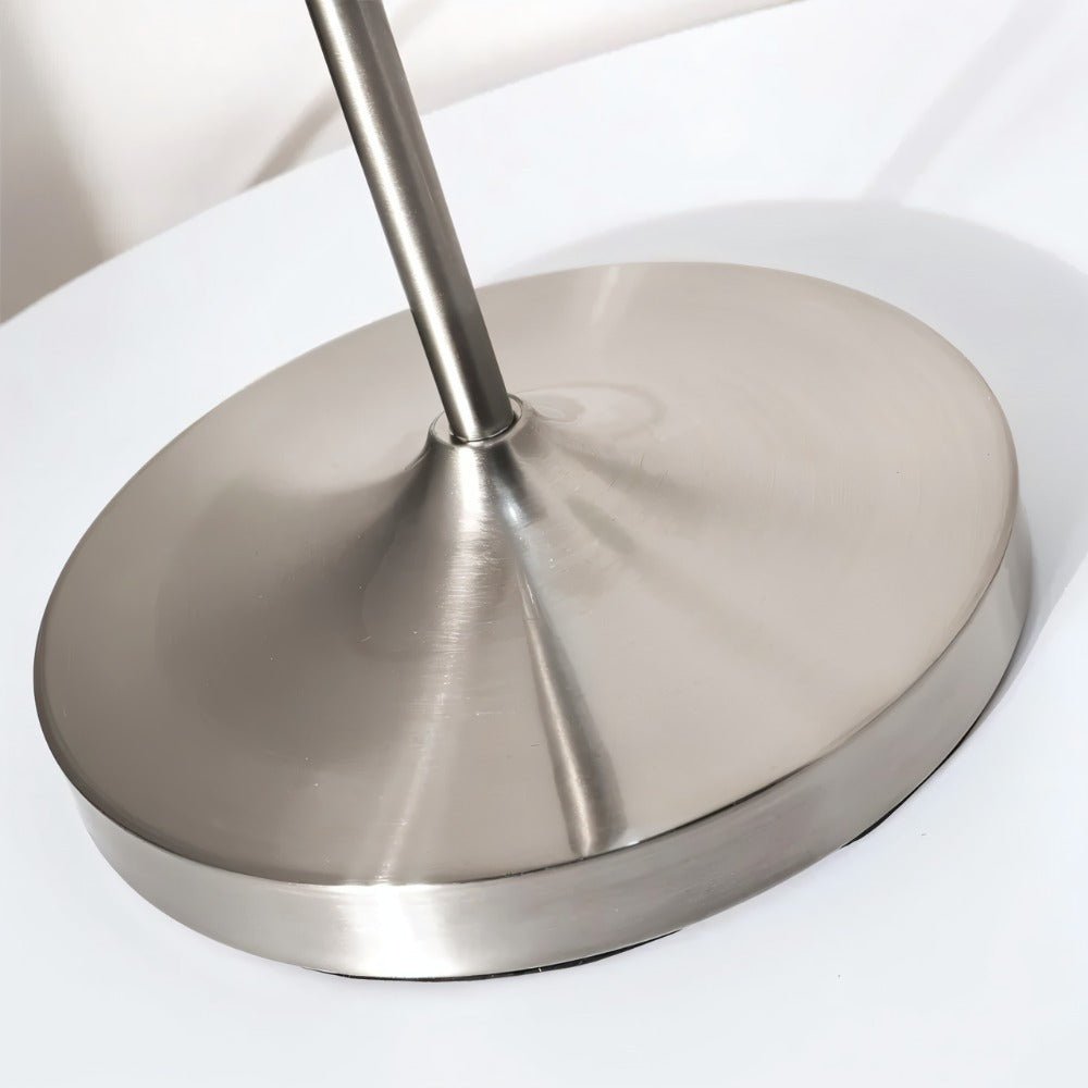 Haela Table Lamp by Residence Supply with a sleek modern design and neutral-colored fabric shade on a wooden base.