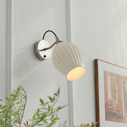 Modern Haela Wall Lamp by Residence Supply featuring sleek design and warm lighting for stylish interior decor.