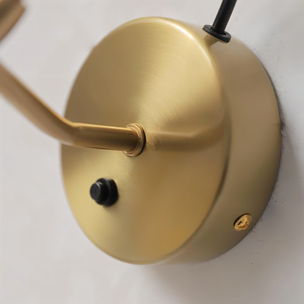 Haela wall lamp by Residence Supply featuring a sleek modern design with a curved metal arm and a white fabric shade.