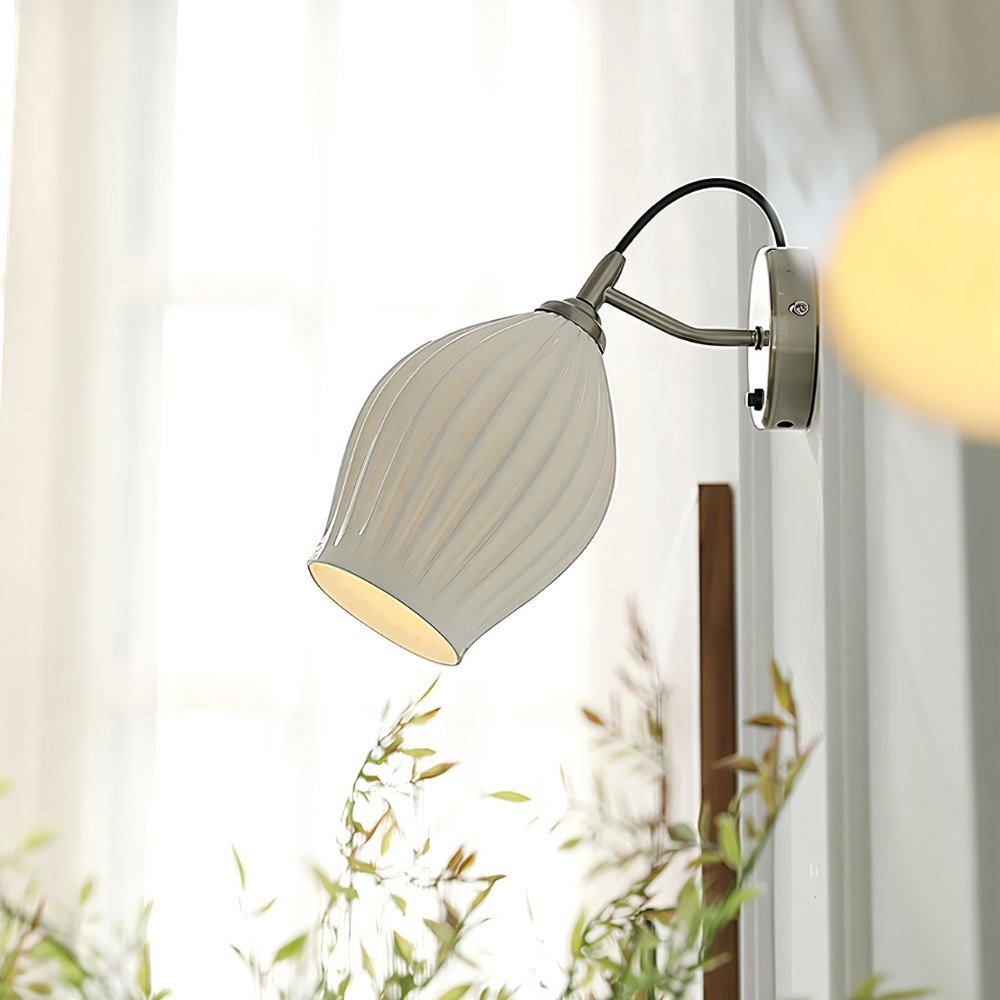 Modern Haela Wall Lamp by Residence Supply featuring a sleek metal finish and minimalist design for stylish interior lighting.