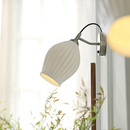 Modern Haela Wall Lamp by Residence Supply featuring a sleek metal finish and minimalist design for stylish interior lighting.