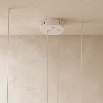 Elegant Halo Chandelier by Residence Supply featuring a circular design with multiple light fixtures and modern glass accents.