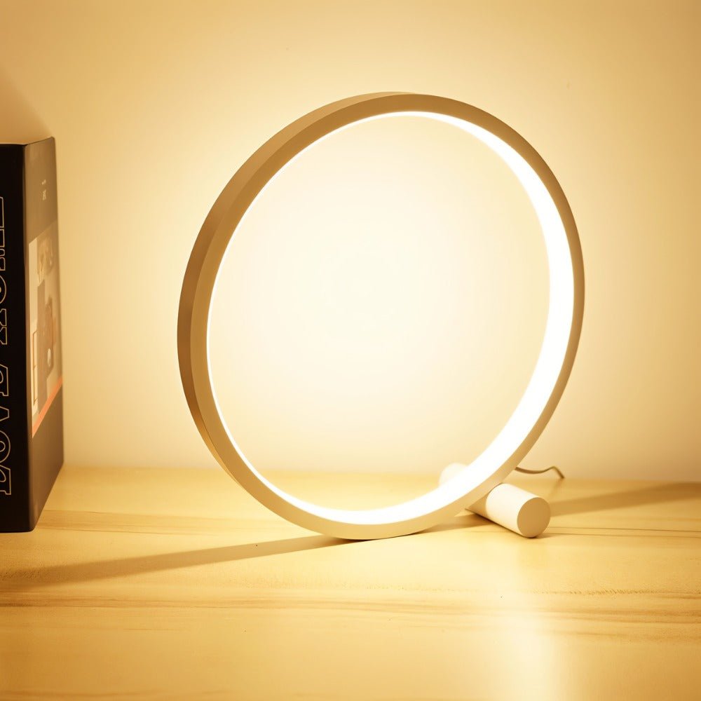 Residence Supply Halo Touch Table Lamp with modern design and touch control, shown on a bedside table in a cozy room setting.