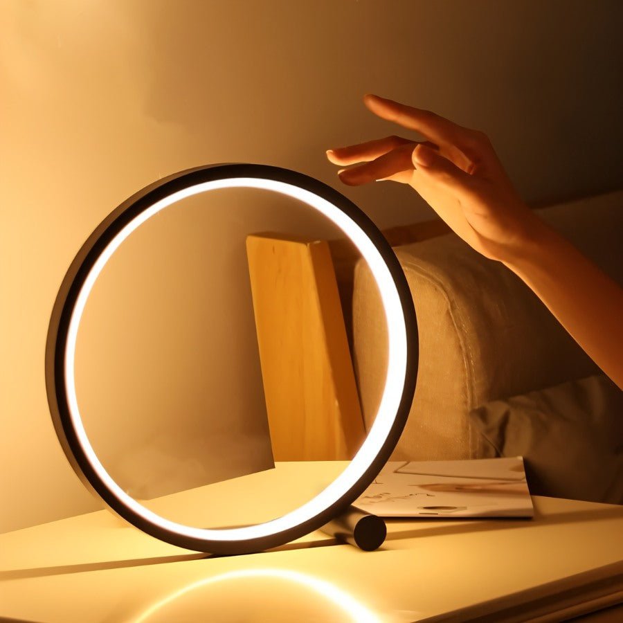 Residence Supply Halo Touch Table Lamp with sleek design and touch control, showcasing its modern aesthetic and illuminated base.