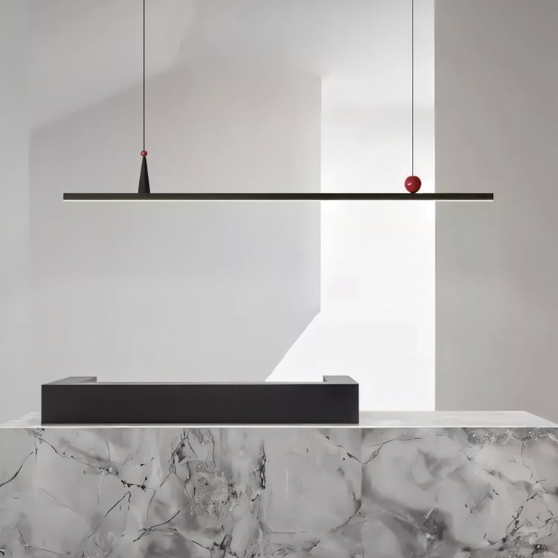 Black Halrya pendant light by Residence Supply, featuring a sleek, linear design with modern hanging fixtures.