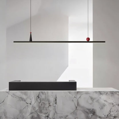 Black Halrya pendant light by Residence Supply, featuring a sleek, linear design with modern hanging fixtures.