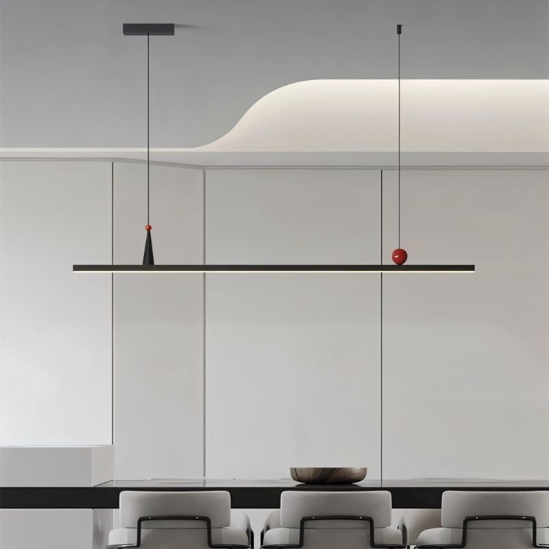 Modern minimalist Halrya Pendant Light by Residence Supply hanging from ceiling with sleek design and warm ambient glow.