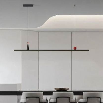 Modern minimalist Halrya Pendant Light by Residence Supply hanging from ceiling with sleek design and warm ambient glow.