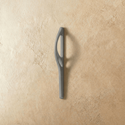 Residue Supply Hazis Pull Bar in black, a sleek cabinet handle for home and garden furniture, mounted on a cabinet door.