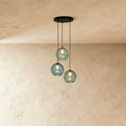 Modern Hea Pendant Light by Residence Supply with a sleek design, hanging from a ceiling fixture in a contemporary interior.