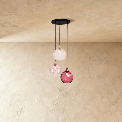 Modern Hea Pendant Light from Residence Supply featuring a sleek design with a white shade hanging from a black cord.