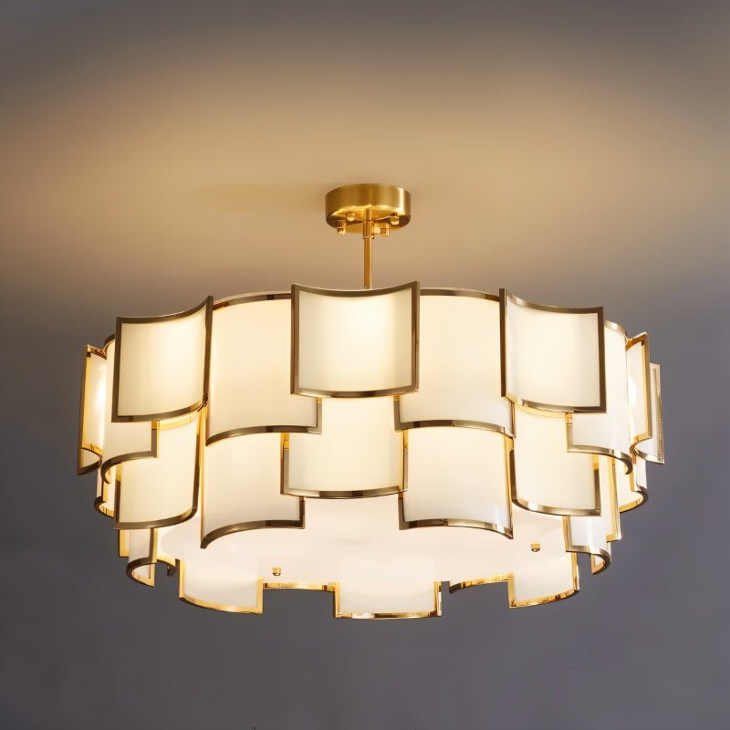 Hiraj chandelier by Residence Supply featuring intricate metalwork and multiple hanging glass bulbs in a stylish lighting fixture.