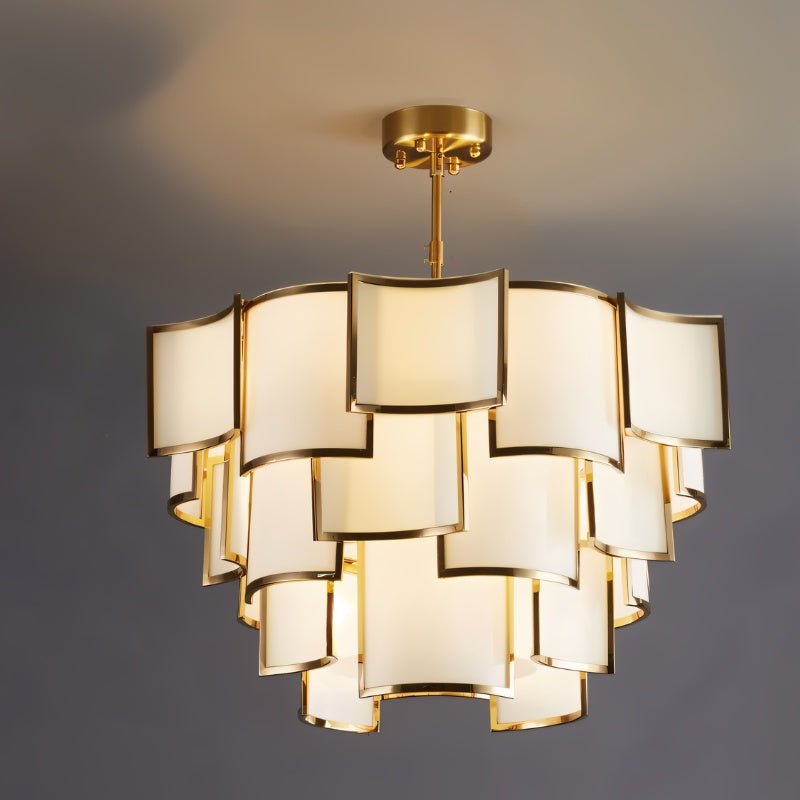 Hiraj chandelier with intricate metal design and multiple bulb holders, hanging from a ceiling fixture in a modern interior.