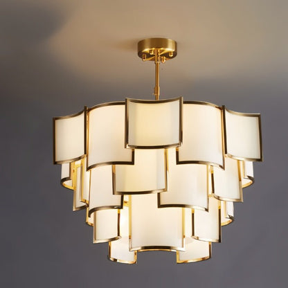 Hiraj chandelier with intricate metal design and multiple bulb holders, hanging from a ceiling fixture in a modern interior.