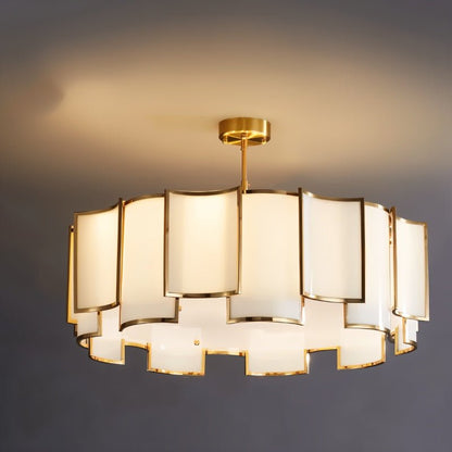 Hiraj chandelier by Residence Supply featuring intricate metalwork and multiple hanging glass shades for elegant lighting.