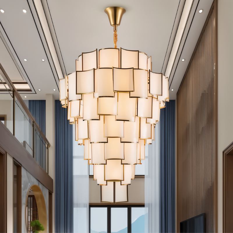 Hiraj chandelier by Residence Supply featuring intricate metalwork and multiple hanging lights for elegant interior lighting.