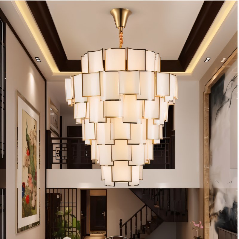 Hiraj chandelier by Residence Supply featuring elegant hanging glass and metal design for modern interior lighting.