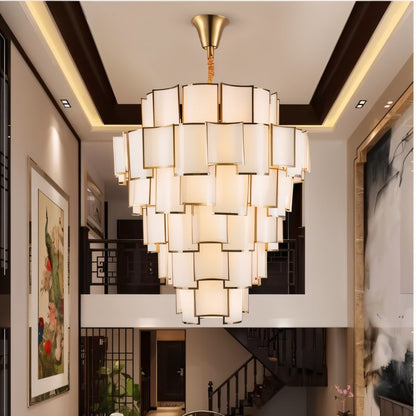 Hiraj chandelier by Residence Supply featuring elegant hanging glass and metal design for modern interior lighting.