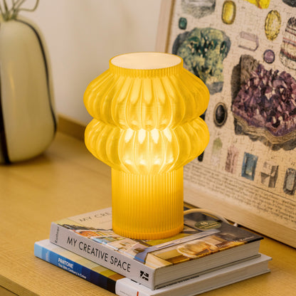 Terra Labs Oppi Table Lamp with honey-colored ceramic base and white fabric shade, modern and stylish for home lighting.