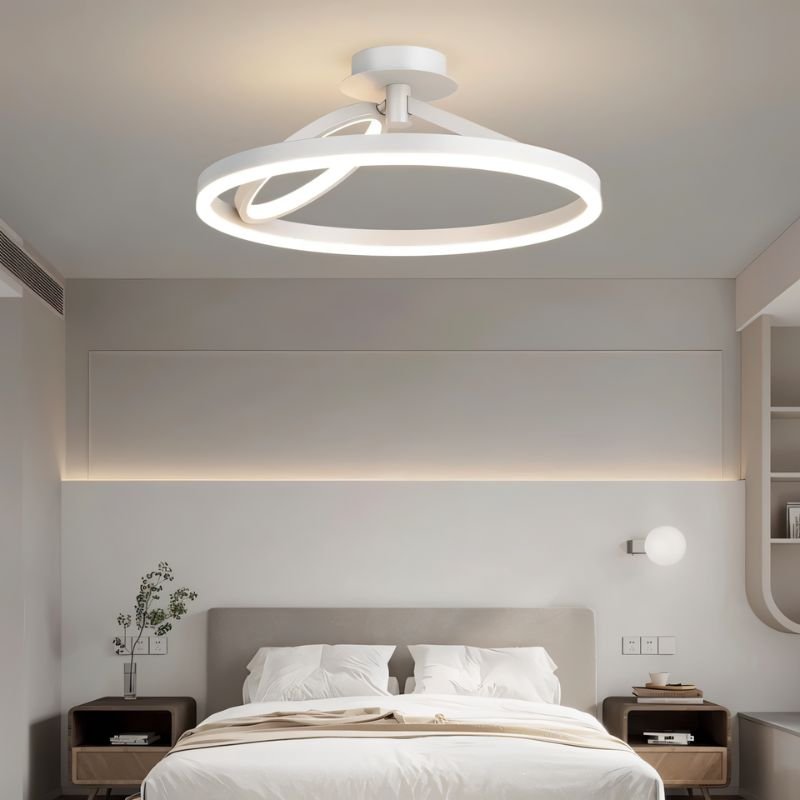 Modern Hring Ceiling Light by Residence Supply featuring a sleek circular design and warm ambient lighting.