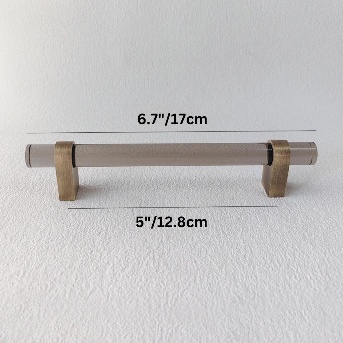 Hyle knob and pull bar from Residence Supply, showcasing sleek metal cabinet hardware for home or garden furniture.