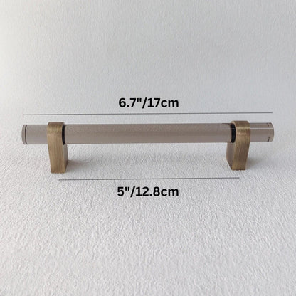 Hyle knob and pull bar from Residence Supply, showcasing sleek metal cabinet hardware for home or garden furniture.