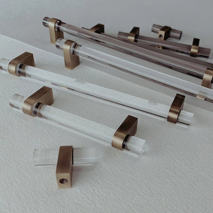 Hyle knob and pull bar from Residence Supply, featuring sleek metal design for cabinet hardware in a home interior.