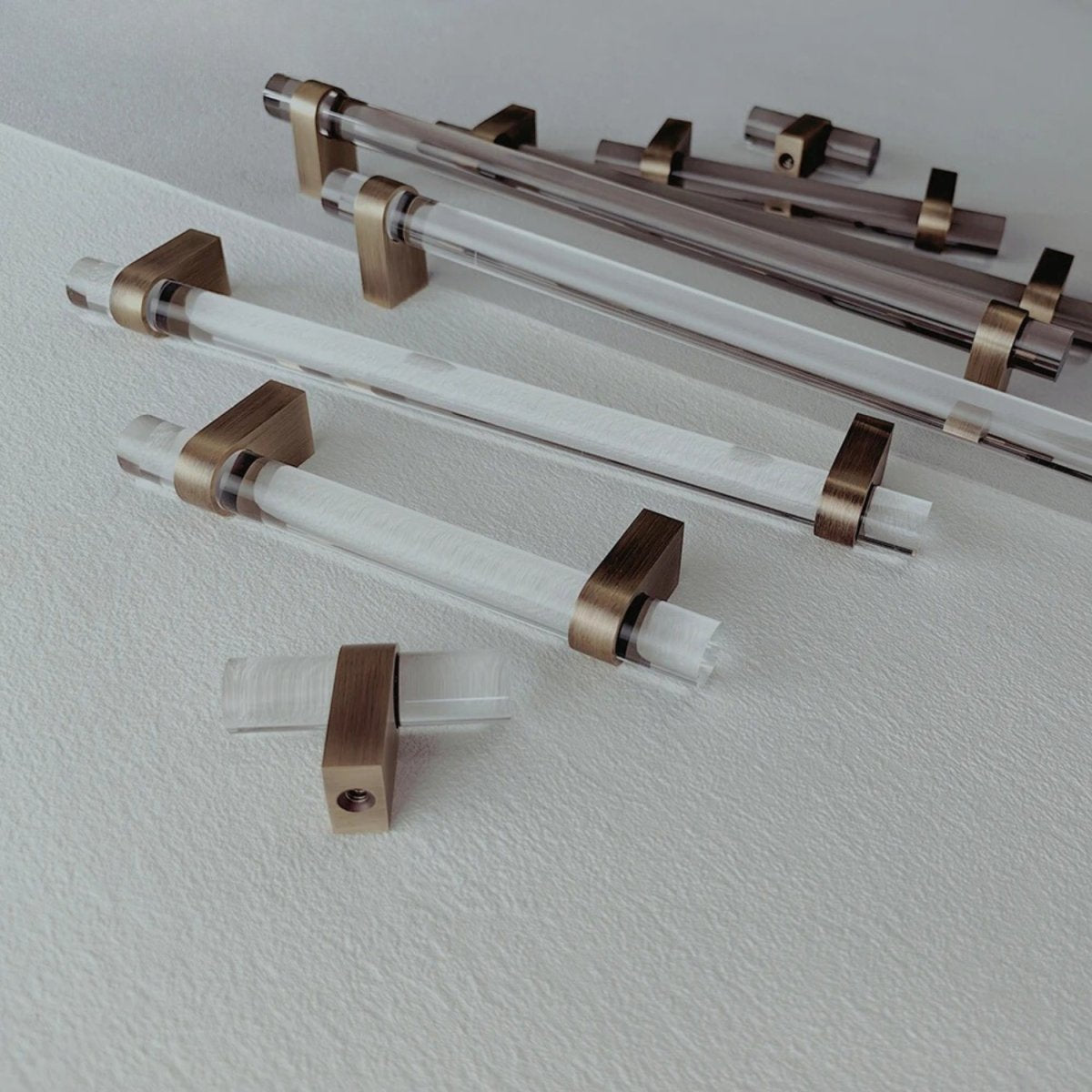Hyle knob and pull bar in brushed nickel finish, made of metal, suitable for cabinet hardware in home and garden projects.