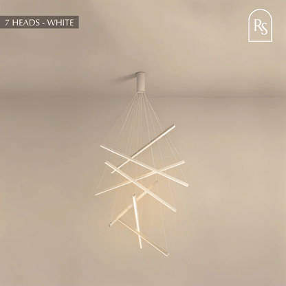 Ilona chandelier by Residence Supply featuring a modern design with multiple hanging light fixtures and elegant metal accents.