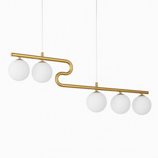 Irides Pendant Light by Residence Supply featuring a colorful, iridescent glass shade hanging from a sleek metal fixture.