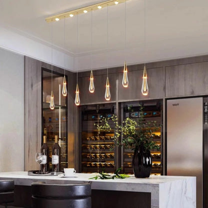 Drop Linear Chandelier by Residence Supply featuring sleek metal bars and modern design with integrated lighting.