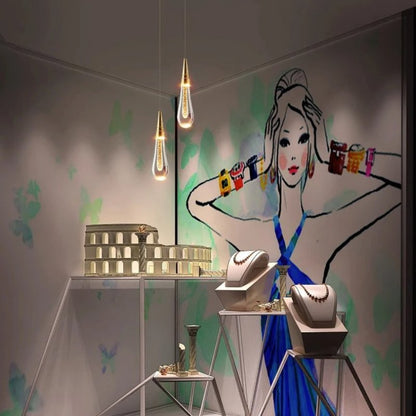 Drop Linear Chandelier by Residence Supply featuring sleek, modern metal design with multiple hanging light fixtures.