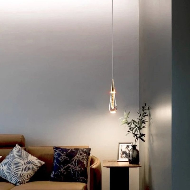 Drop Linear Chandelier by Residence Supply featuring sleek metal and linear design with multiple hanging light fixtures.