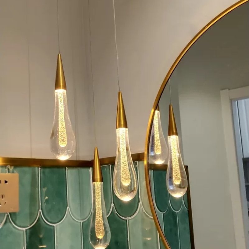 Drop Linear Chandelier by Residence Supply featuring sleek, modern design with multiple linear light fixtures hanging from a central frame.