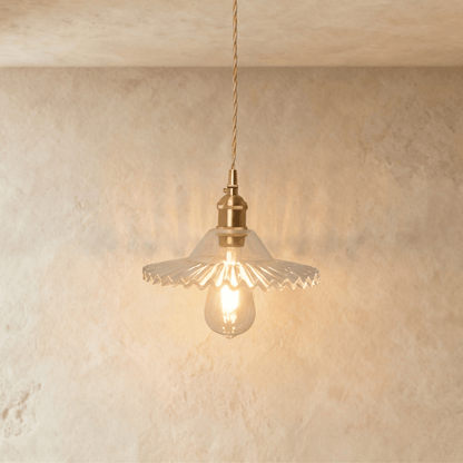 Residence Supply Isabel pendant light with a sleek, modern design featuring a round shade and stylish metal finish.