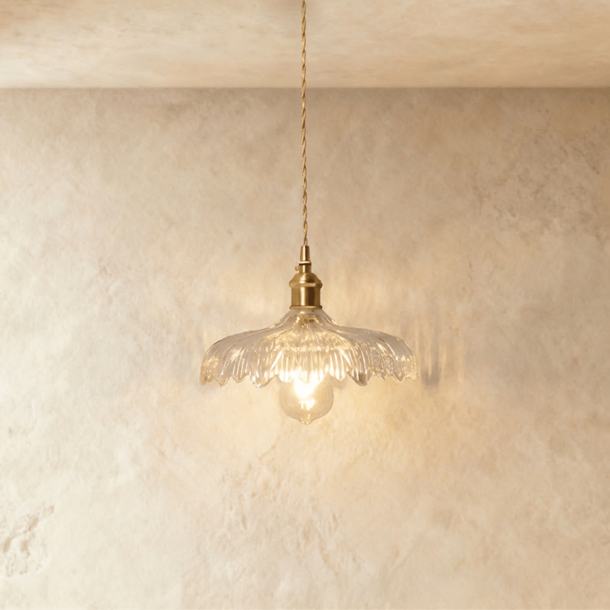 Residence Supply Isabel Pendant Light hanging fixture with a modern design and sleek metal finish.