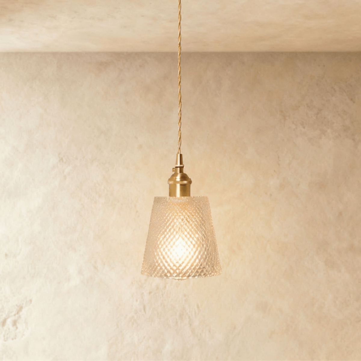 Residence Supply Isabel Pendant Light hanging with a sleek design and metal finish, ideal for modern interior lighting.