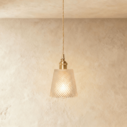 Residence Supply Isabel Pendant Light hanging with a sleek design and metal finish, ideal for modern interior lighting.