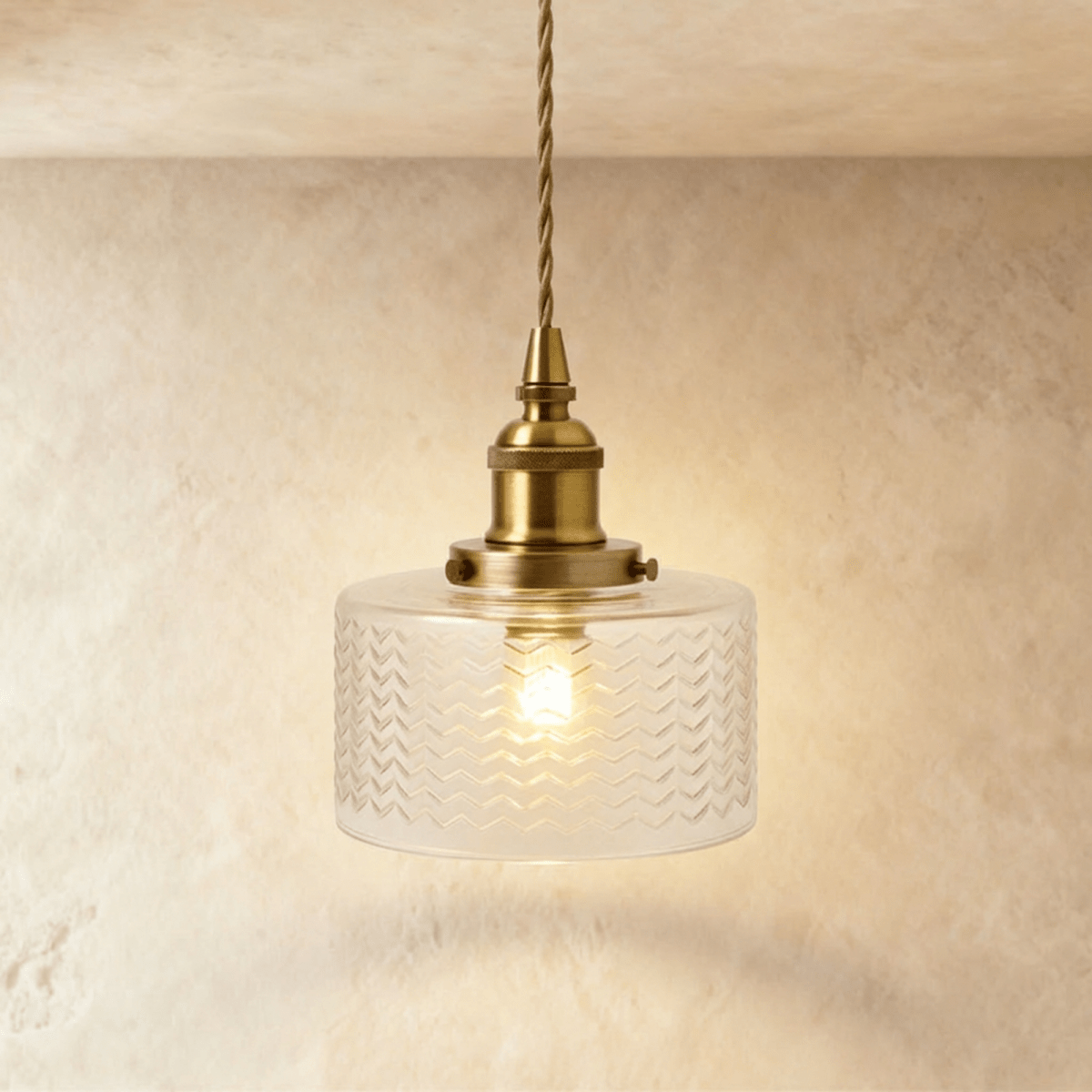 Isabel pendant light by Residence Supply with a sleek, modern design featuring a metal shade and hanging cord.