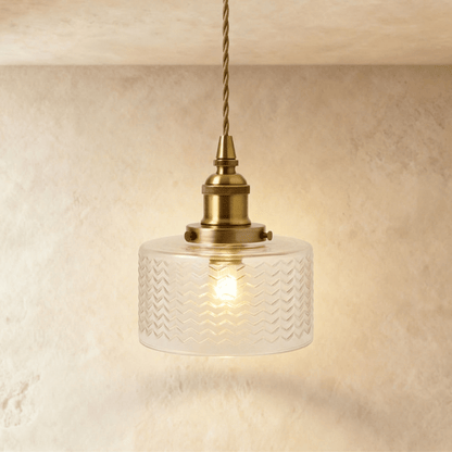 Isabel pendant light by Residence Supply with a sleek, modern design featuring a metal shade and hanging cord.