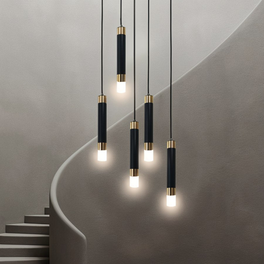 Ivanna Pendant Light by Residence Supply featuring a modern design with metal and glass elements, hanging from a ceiling mount.
