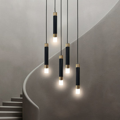 Ivanna Pendant Light by Residence Supply featuring a modern design with metal and glass elements, hanging from a ceiling mount.