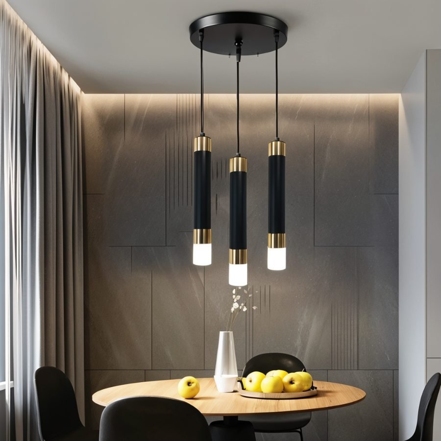 Ivanna Pendant Light by Residence Supply featuring a modern design with a sleek metal finish and a clear glass shade.
