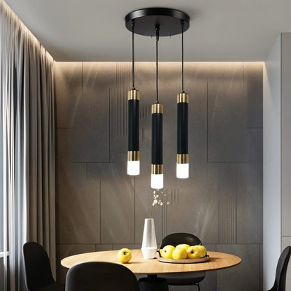 Ivanna Pendant Light by Residence Supply featuring a modern design with a sleek metal finish and a clear glass shade.